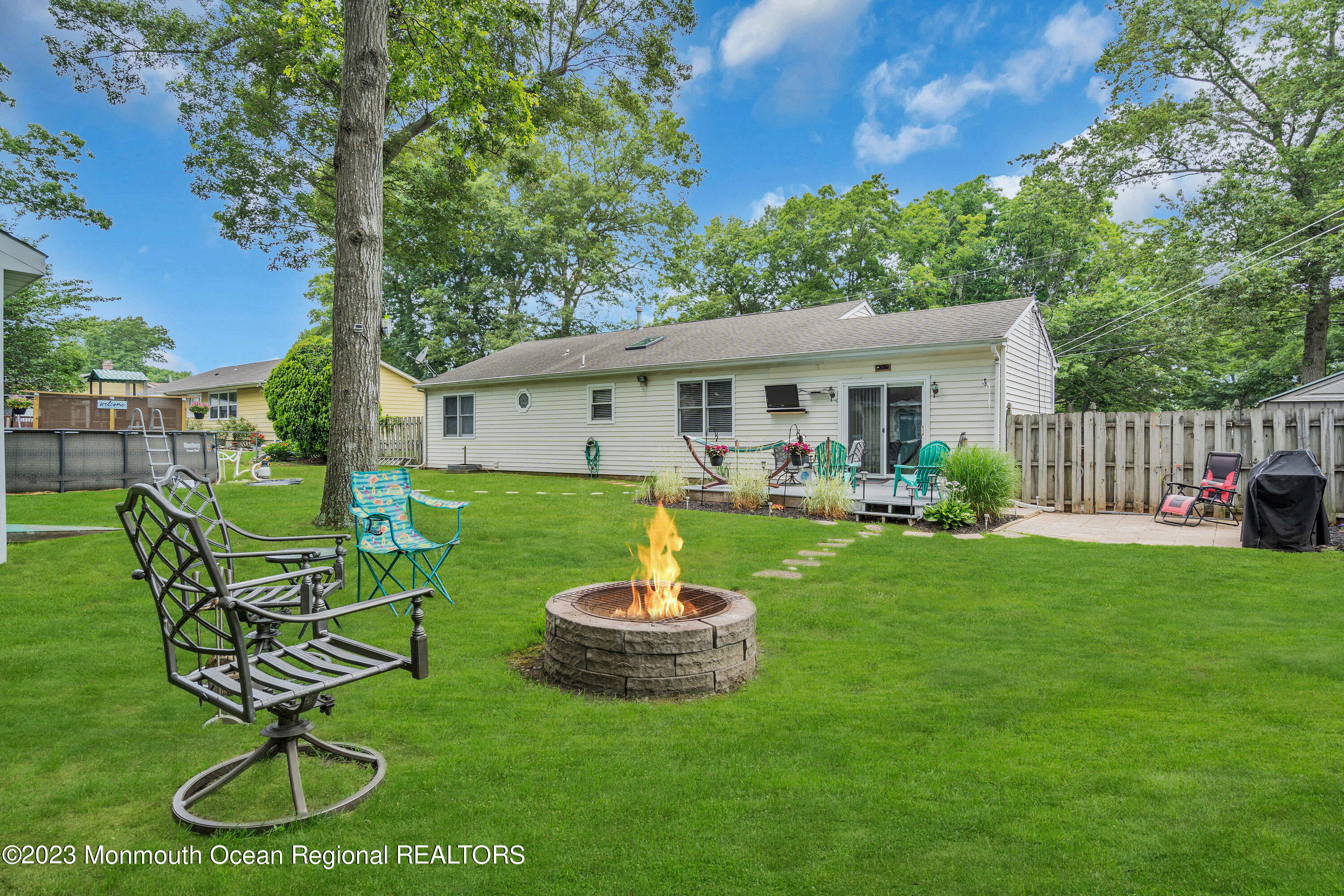 20 Woodland Road Bayville, NJ 08721 - Photo 60 of 62 a view of a house with backyard porch and sitting area