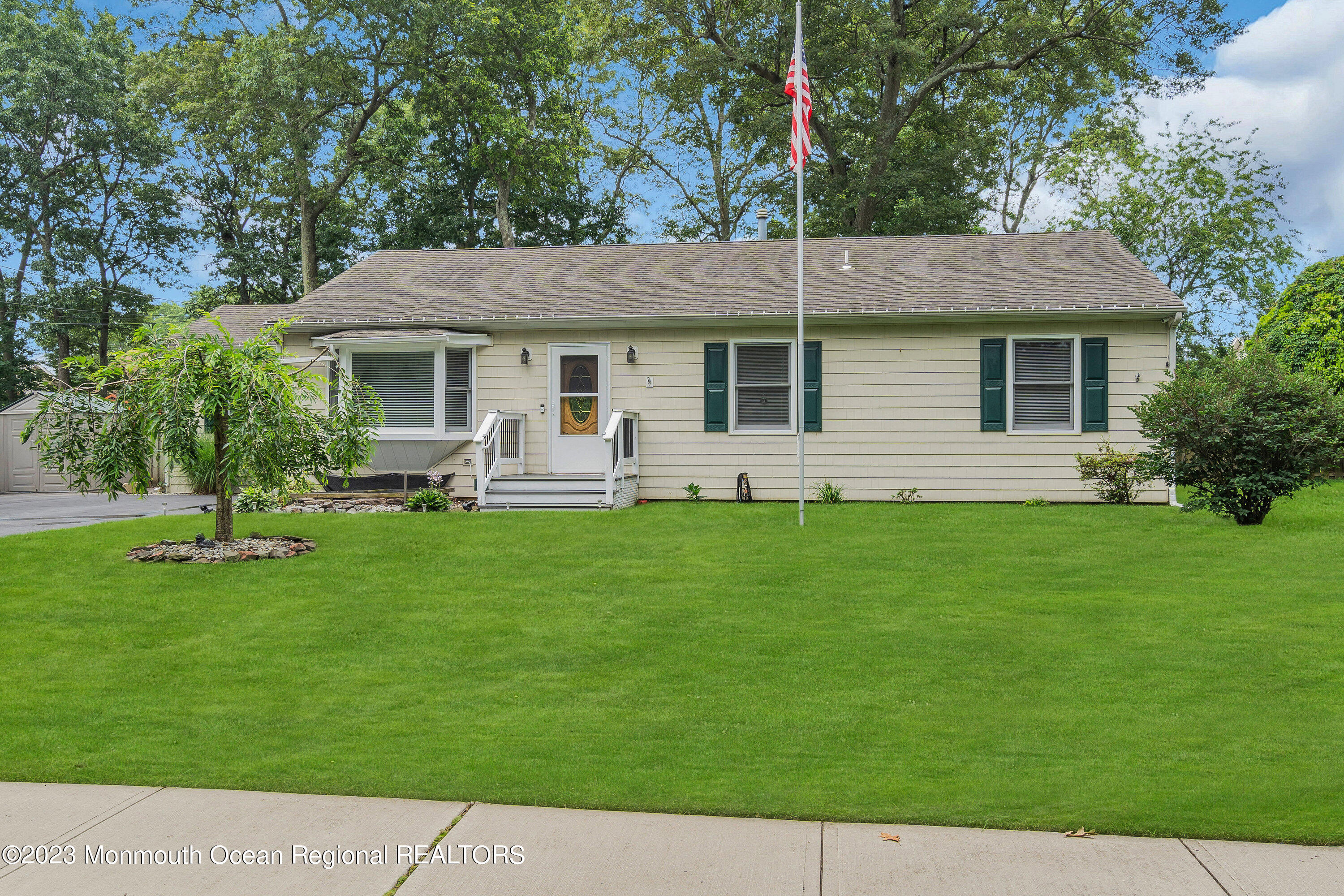 20 Woodland Road Bayville, NJ 08721 - Photo 10 of 62 a front view of house with yard and green space