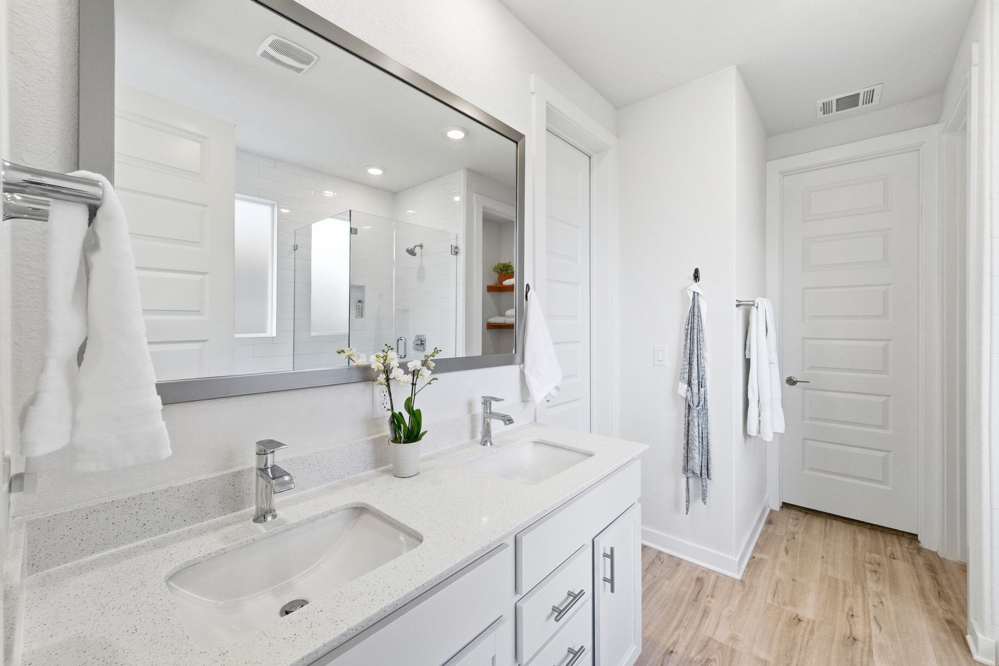 4420 Ingram Road Georgetown, TX 78628 - Photo 18 of 40 Bathroom with a stall shower, double vanity, light wood-style floors, and recessed lighting