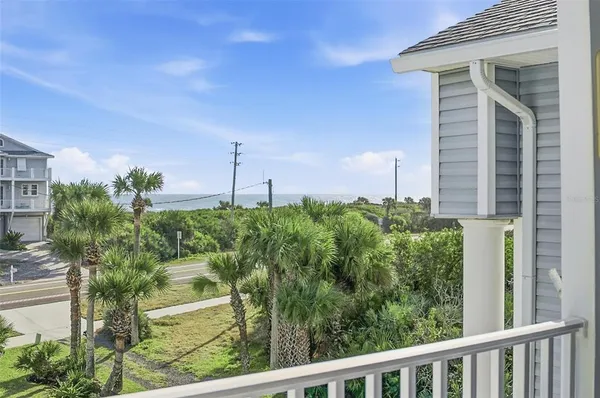 a view of a house with backyard porch and patio