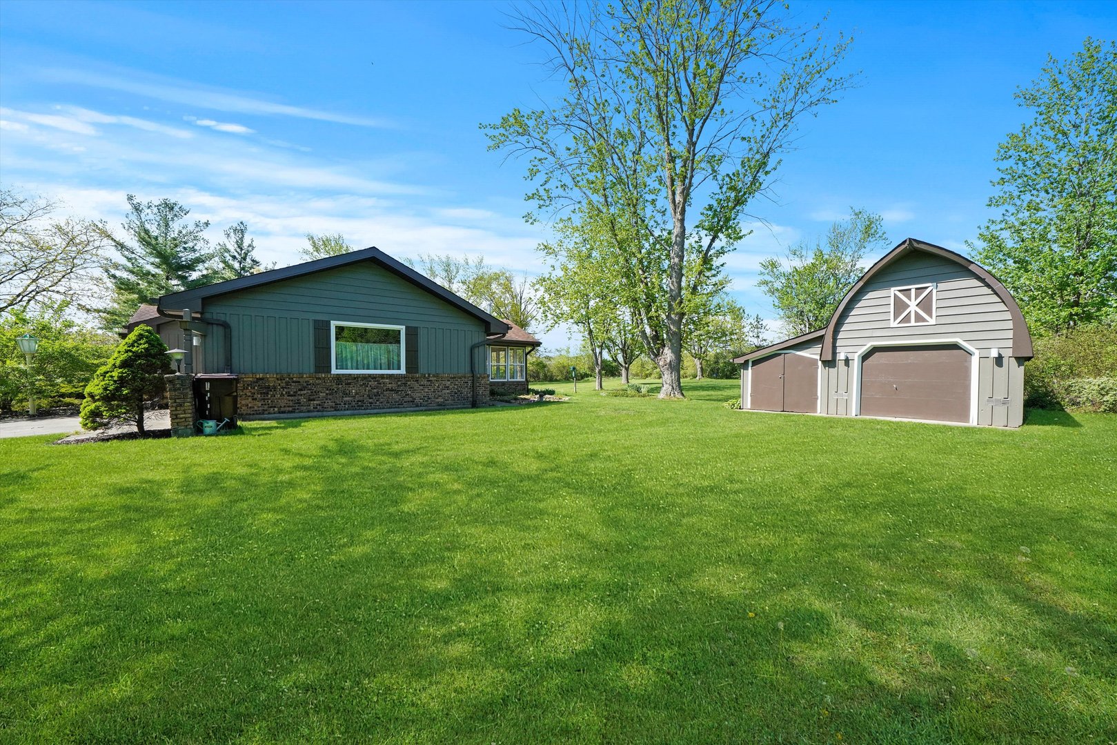 24350 Laura Lane Crete, IL 60417 - Photo 15 of 16 a house view with a garden space
