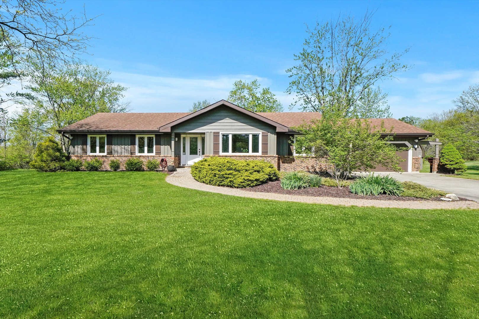 24350 Laura Lane Crete, IL 60417 - Photo 16 of 16 a front view of a house with a yard