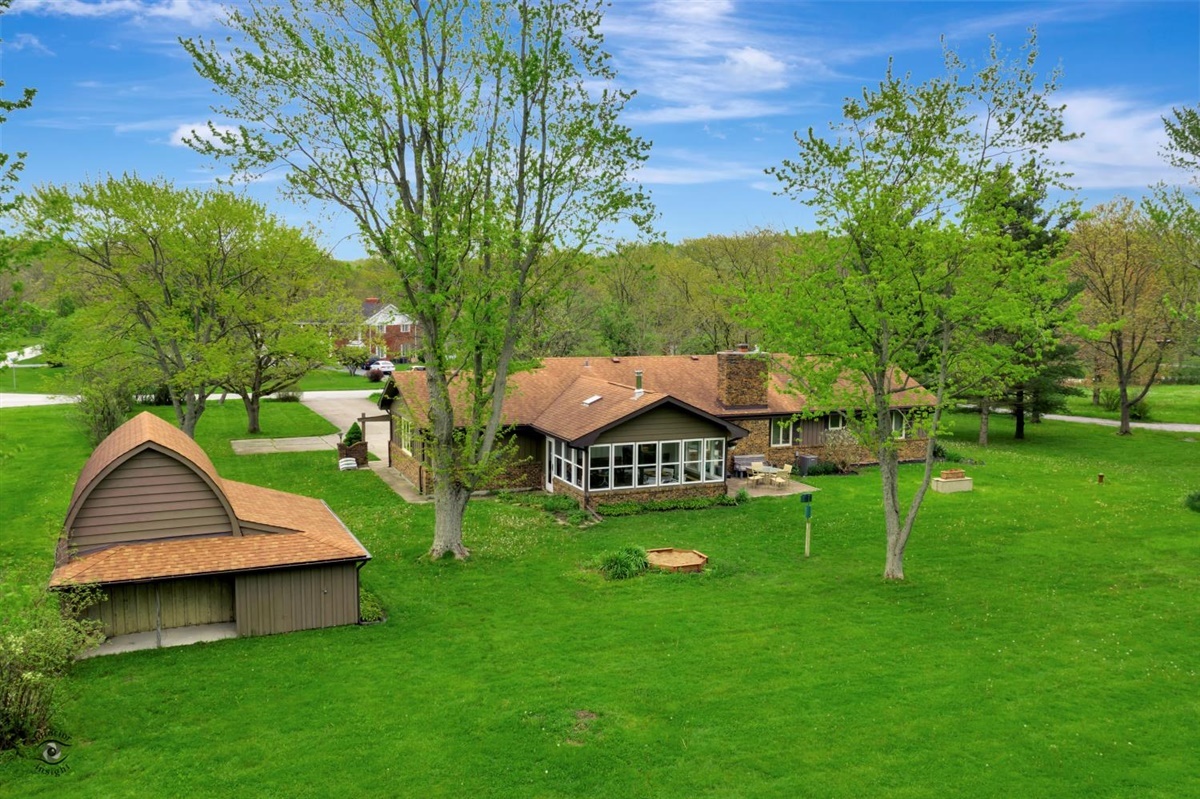 24350 Laura Lane Crete, IL 60417 - Photo 3 of 16 a view of a table and chairs in the garden