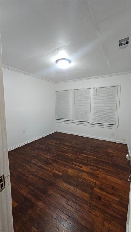 1007 Willow Street Bonham, TX 75418 - Photo 9 of 11 a view of empty room with wooden floor