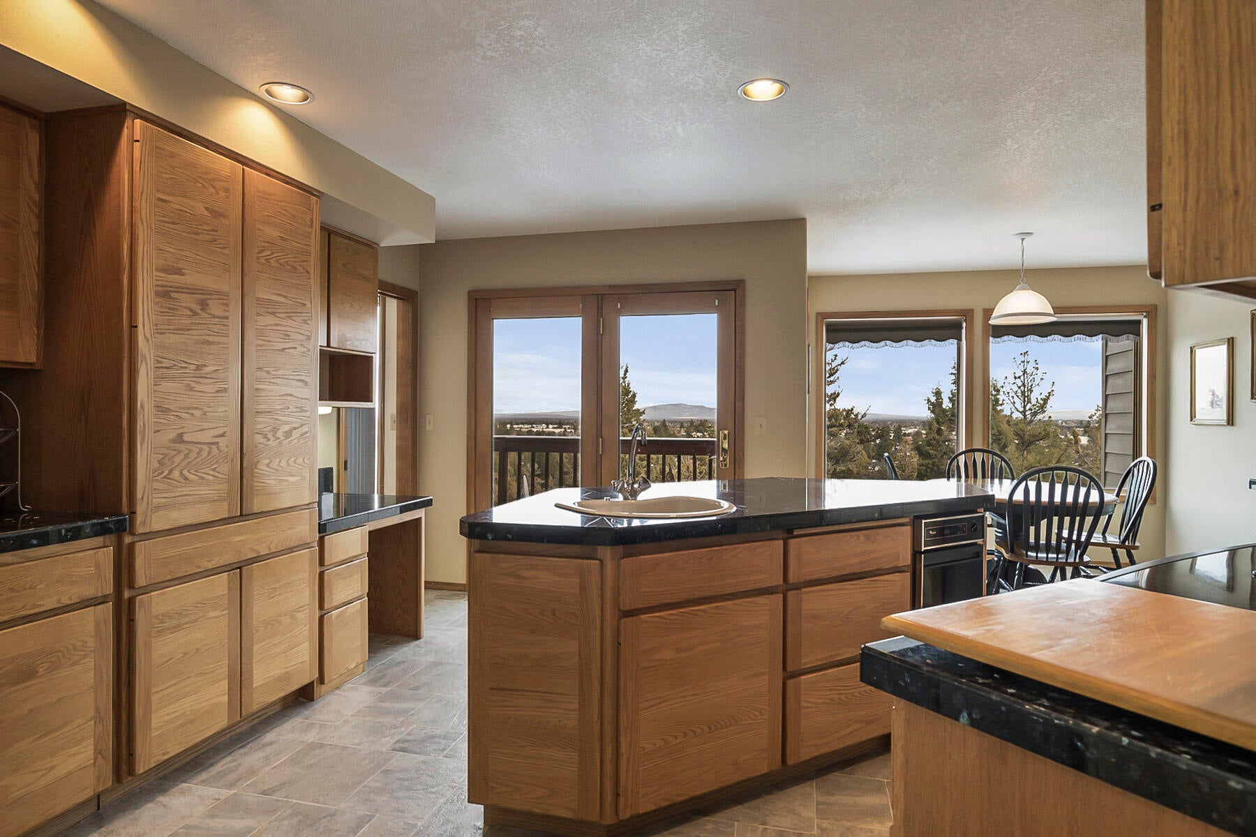 3808 Northwest Summerfield Road Bend, OR 97703 - Photo 16 of 38 Tons of cupboard and counter space in this well thought out kitchen