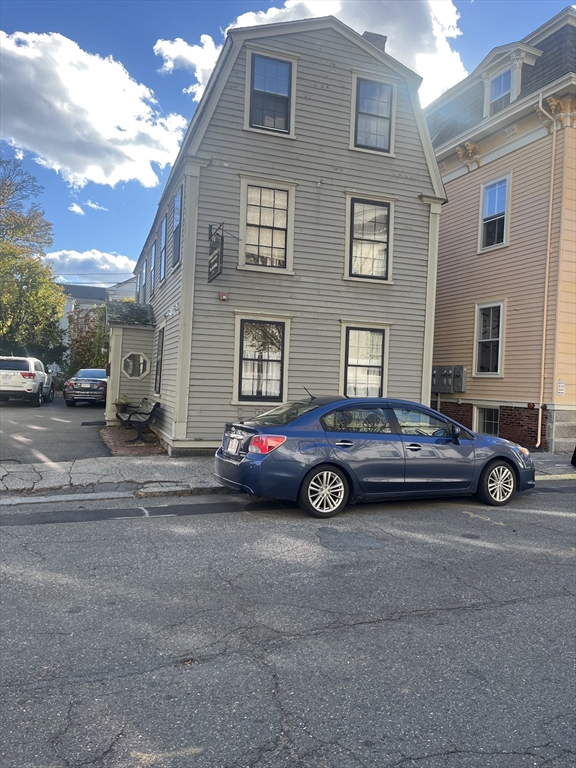 a car parked in front of a house