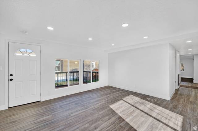 2491 Highway 89, Unit 523 Pleasant View, UT 84404 - Photo 5 of 31 Foyer with dark wood finished floors and recessed lighting