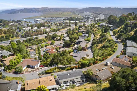 an aerial view of a city with lots of residential buildings