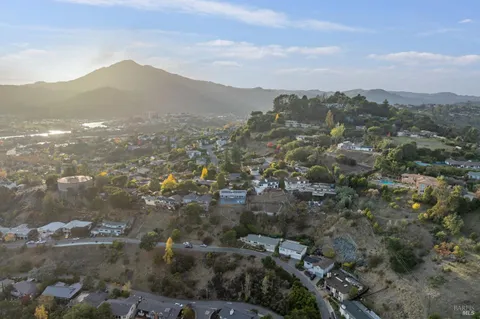 a view of a city with mountains in the background