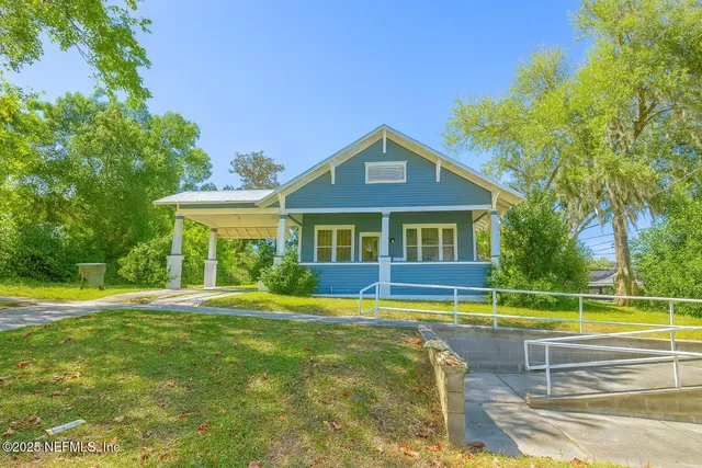 a view of a house with a swimming pool