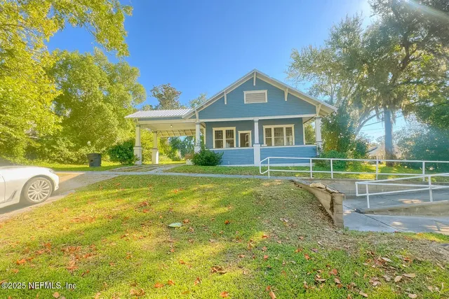 a view of a house with a swimming pool