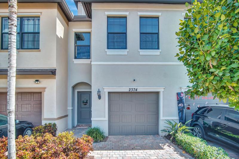 2374 Post Street Palm Springs, FL 33406 - Photo 2 of 28 Front