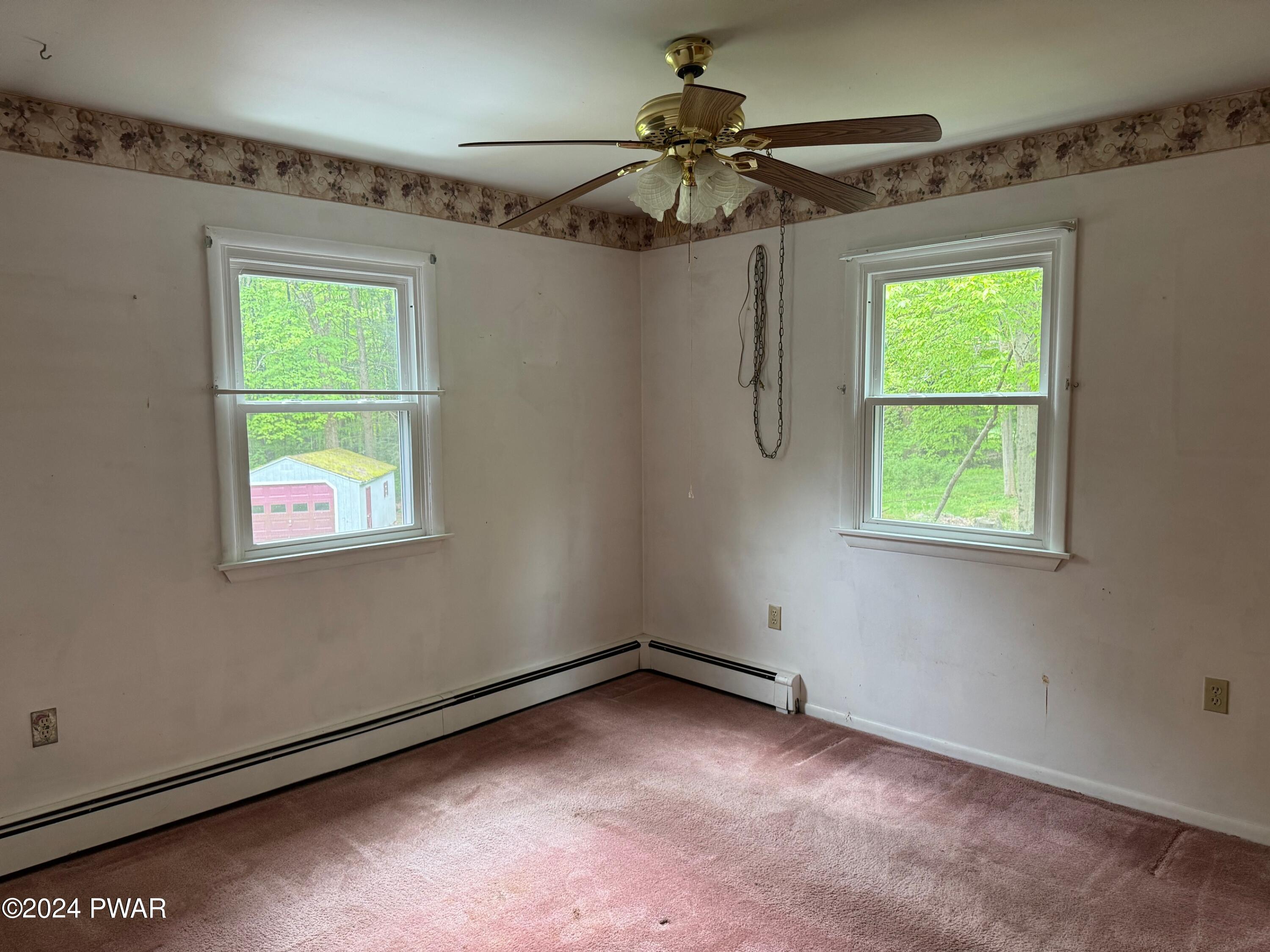 359 Canaan Road Waymart, PA 18472 - Photo 18 of 32 a view of a room with a window