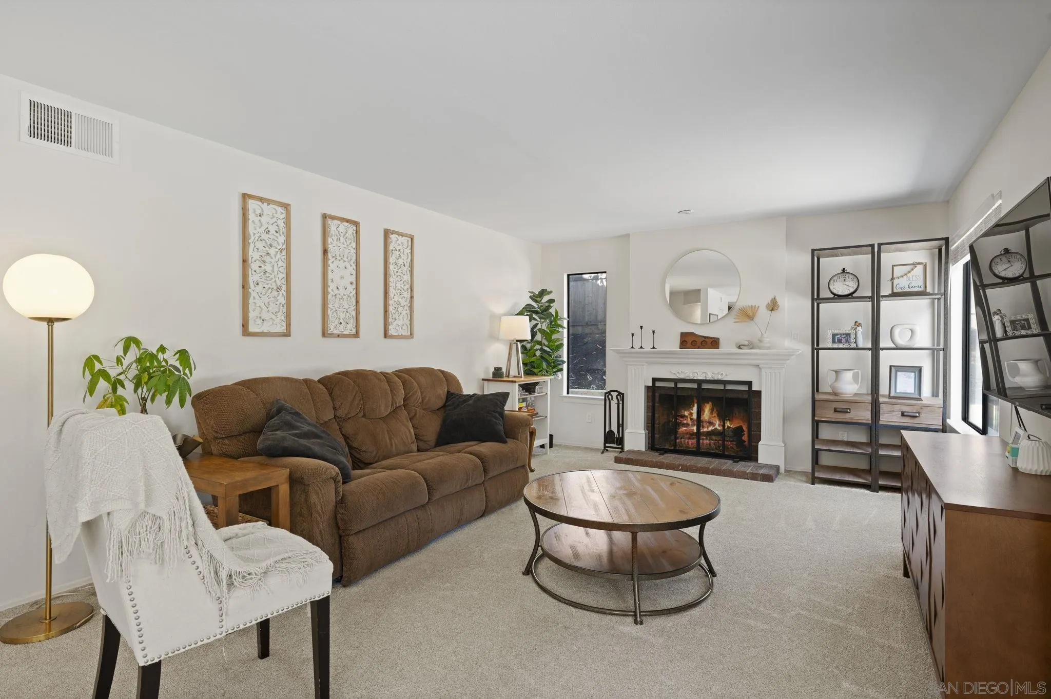 14725 Fieldview Way Poway, CA 92064 - Photo 16 of 67 a living room with furniture and a fireplace