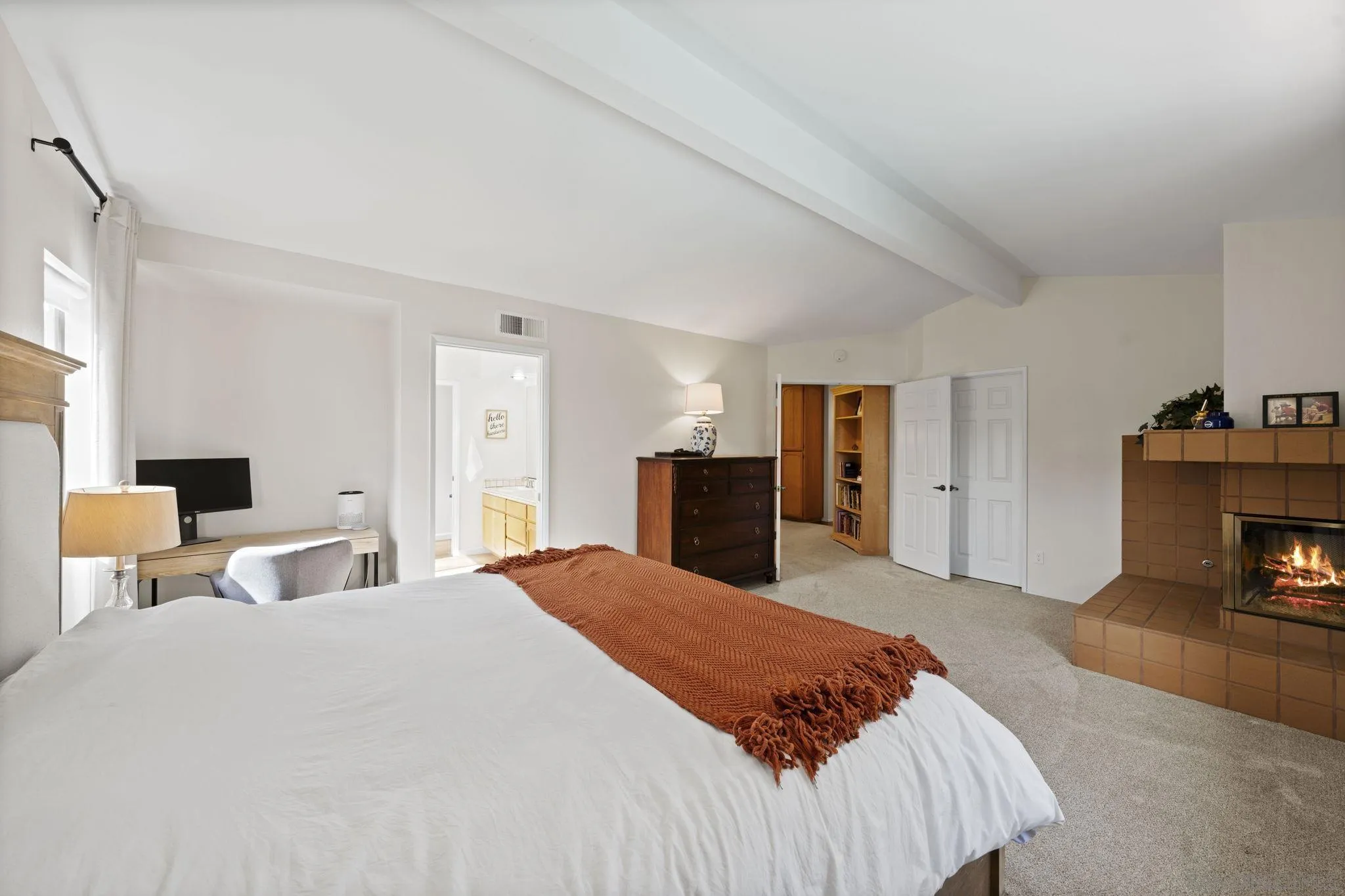 14725 Fieldview Way Poway, CA 92064 - Photo 25 of 67 a spacious bedroom with a bed and a fireplace