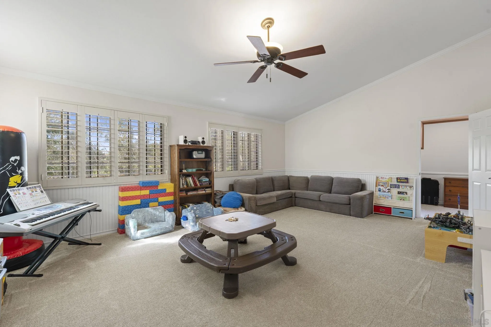 14725 Fieldview Way Poway, CA 92064 - Photo 32 of 67 a living room with furniture and a flat screen tv