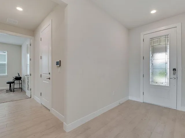a view of a livingroom with furniture and wooden floor
