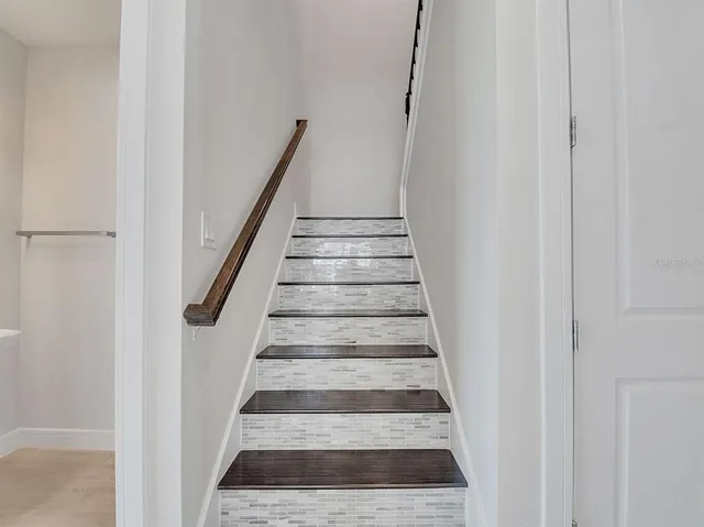 a view of entryway with wooden floor