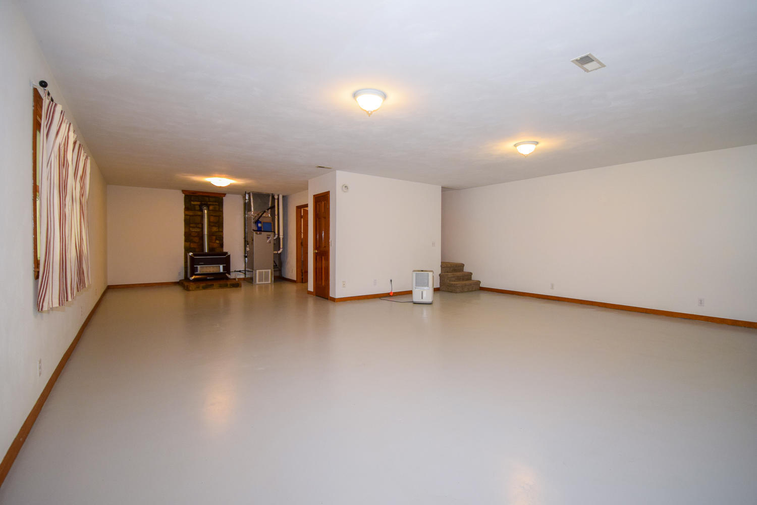 16415 Paint Bank Road Paint Bank, VA 24131 - Photo 21 of 36 a view of a livingroom with a staircase
