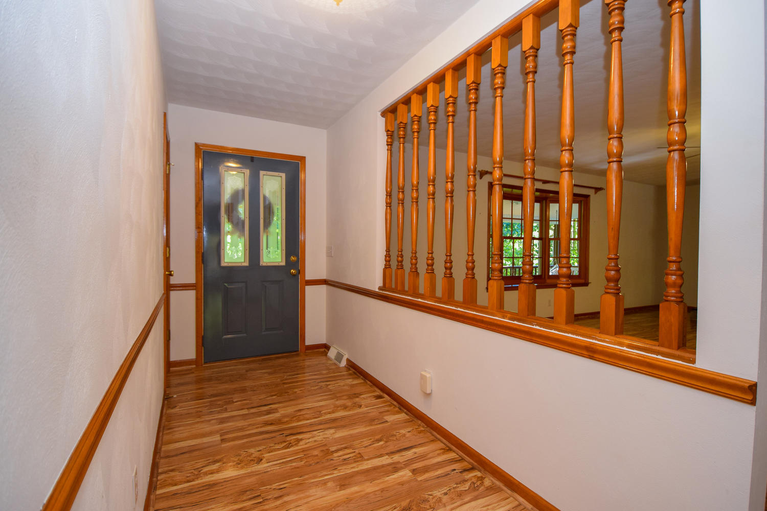 16415 Paint Bank Road Paint Bank, VA 24131 - Photo 4 of 36 a view of a balcony with wooden floor and stairs