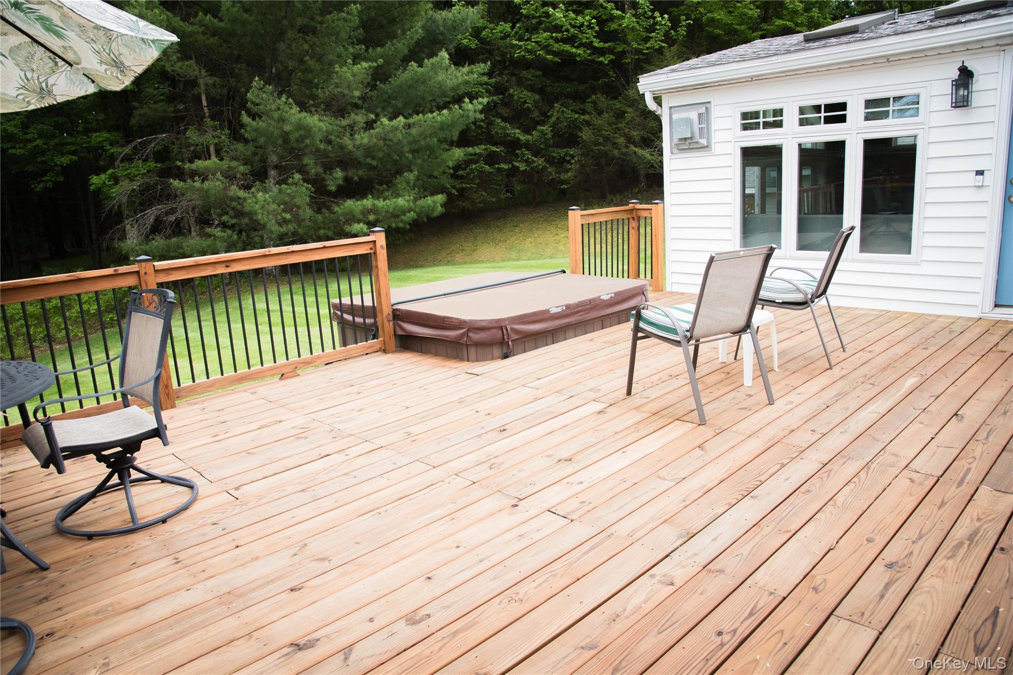 502 Myers Road Neversink, NY 12765 - Photo 37 of 38 a view of balcony with wooden floor and outdoor seating