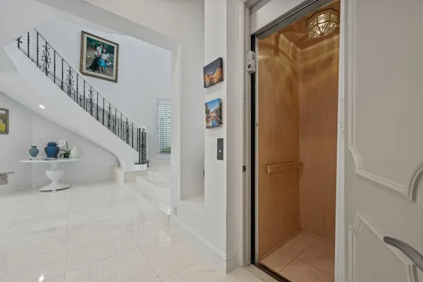 a kitchen with a stove a sink and a refrigerator