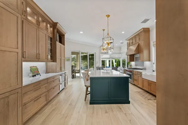 a spacious bedroom with a bed and a flat screen tv