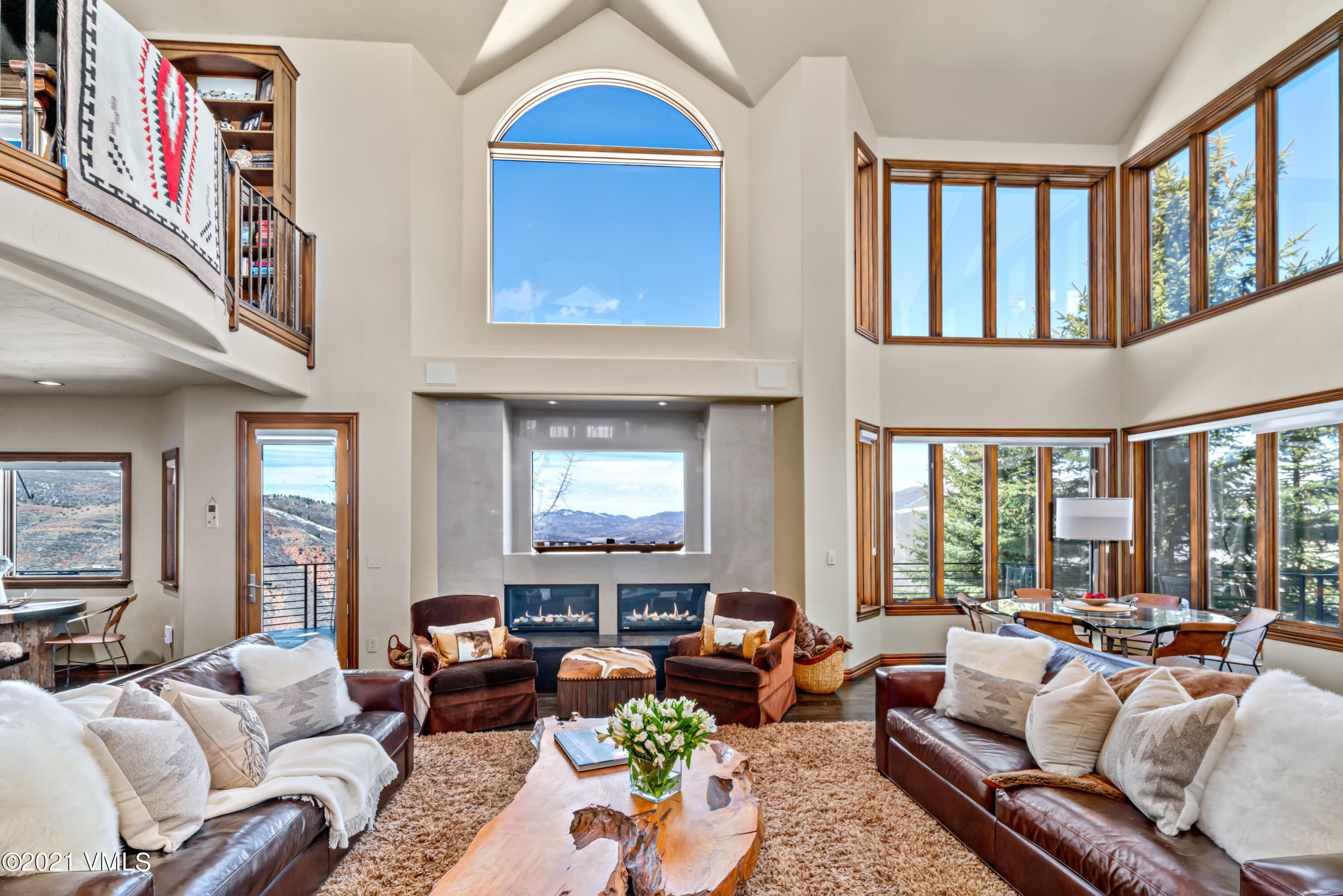 240 Casteel Ridge Edwards, CO 81632 - Photo 15 of 83 a living room with furniture fireplace and a large window