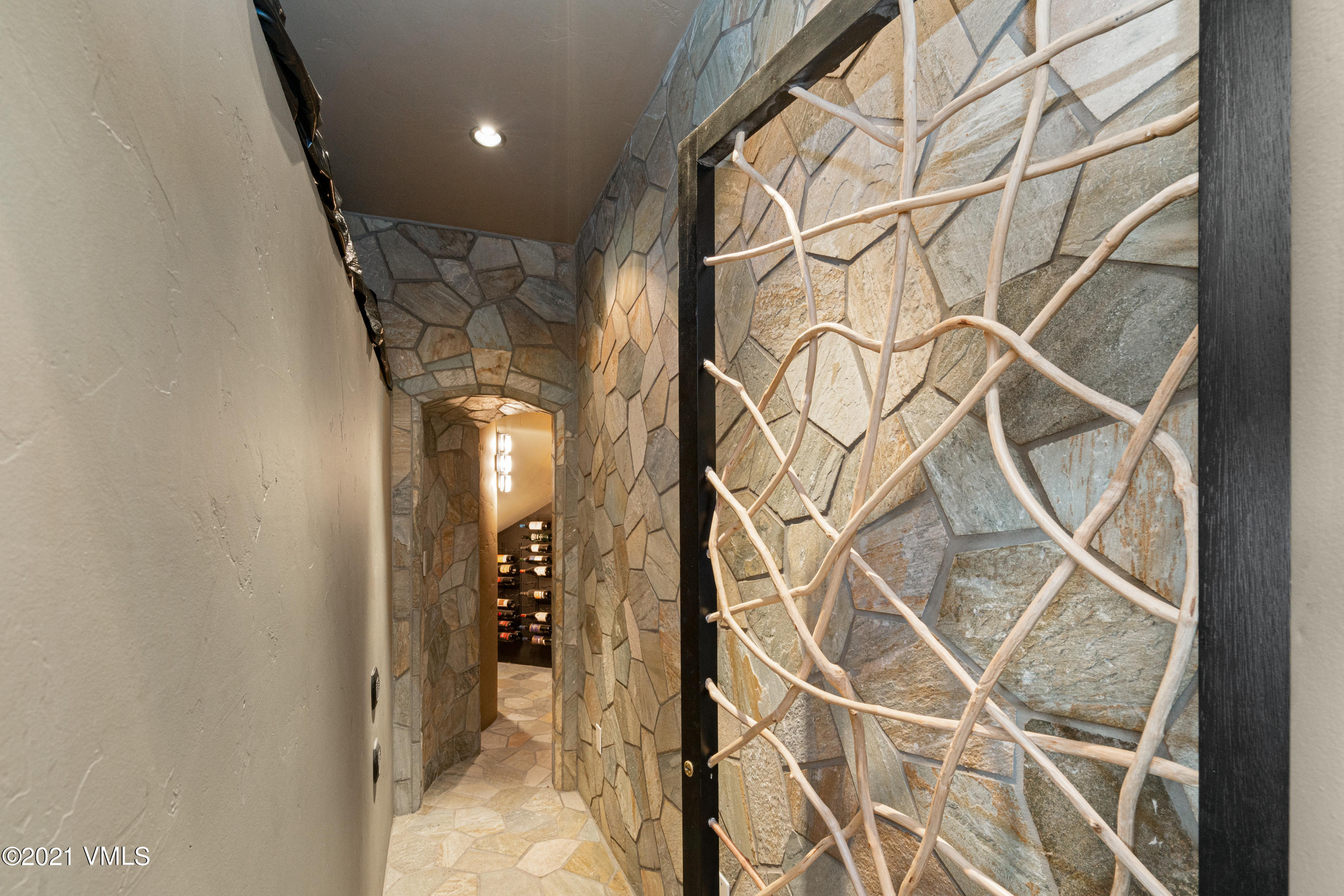 240 Casteel Ridge Edwards, CO 81632 - Photo 25 of 83 a view of a hallway with wooden floor