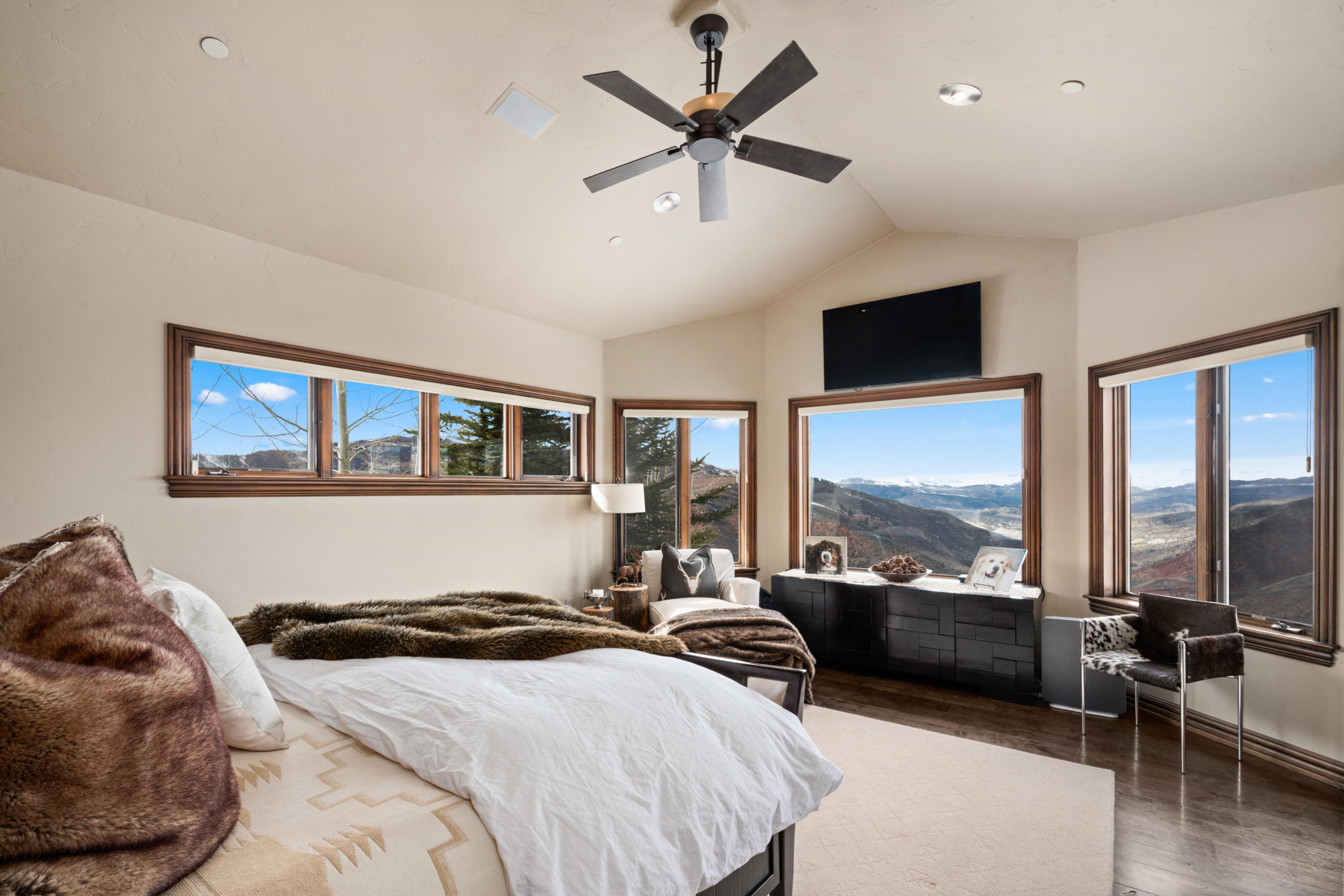 240 Casteel Ridge Edwards, CO 81632 - Photo 34 of 83 a bedroom with a bed and a large window