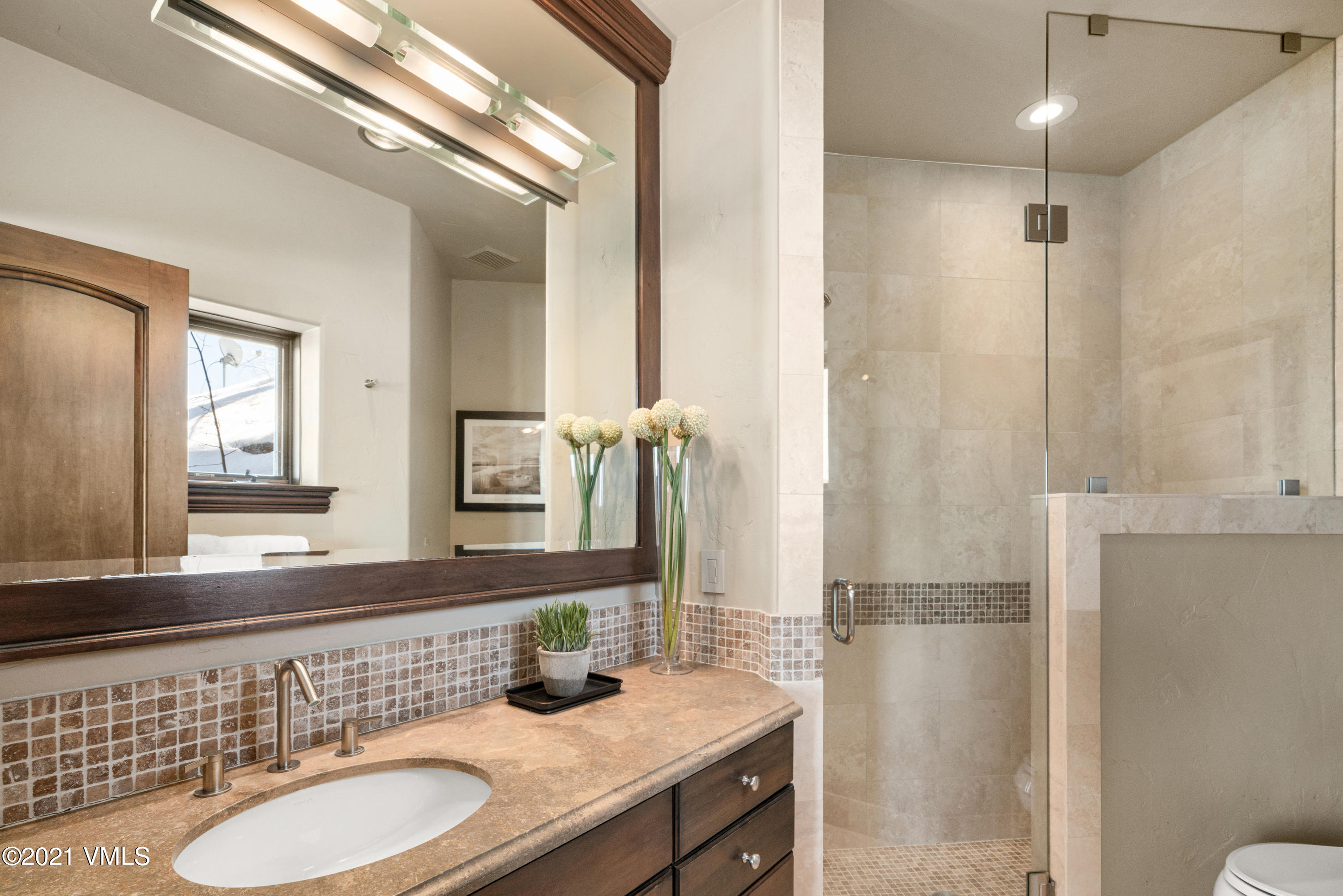 240 Casteel Ridge Edwards, CO 81632 - Photo 51 of 83 a bathroom with a granite countertop double vanity sink and mirror