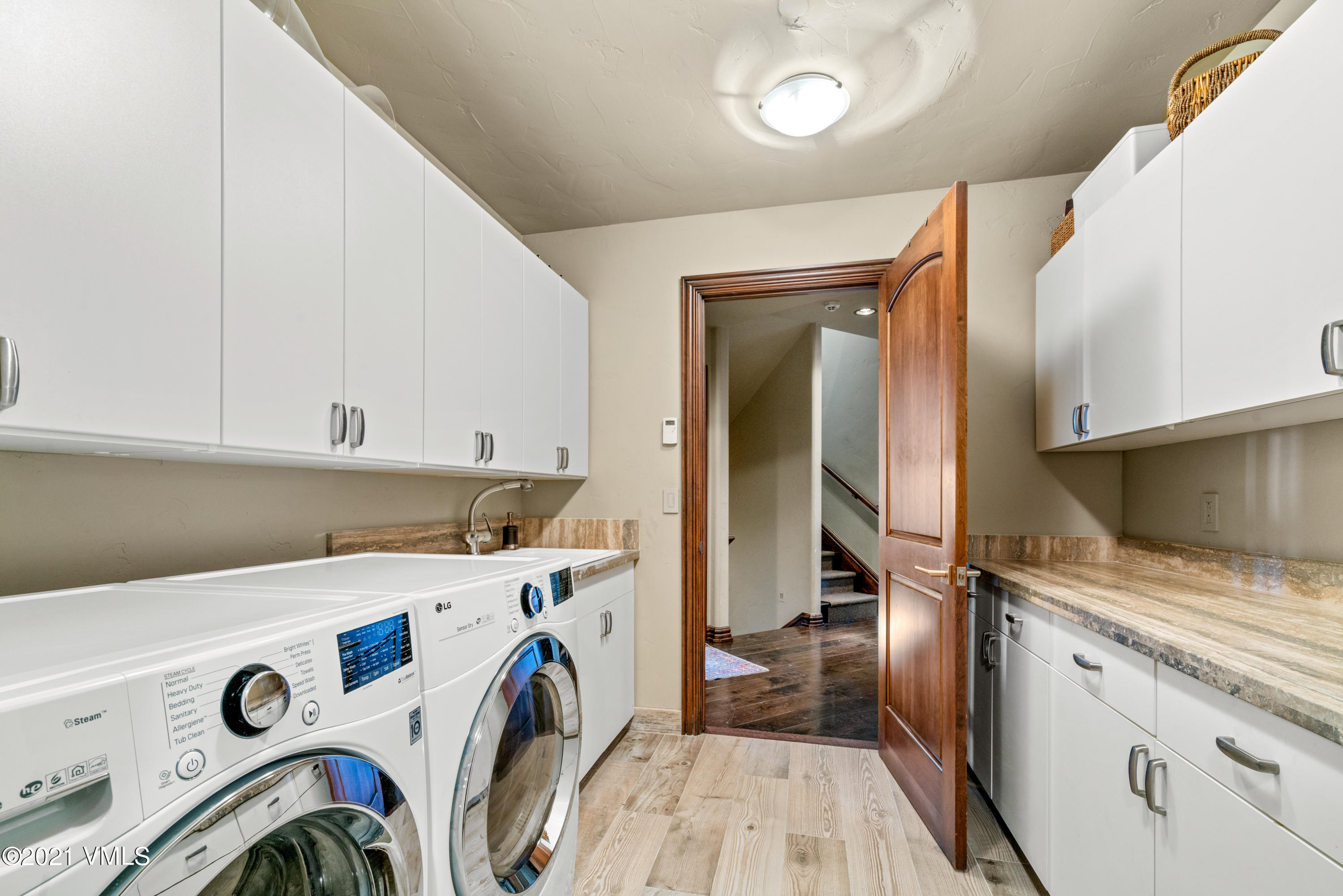 240 Casteel Ridge Edwards, CO 81632 - Photo 53 of 83 a view of storage and utility room with washer and dryer