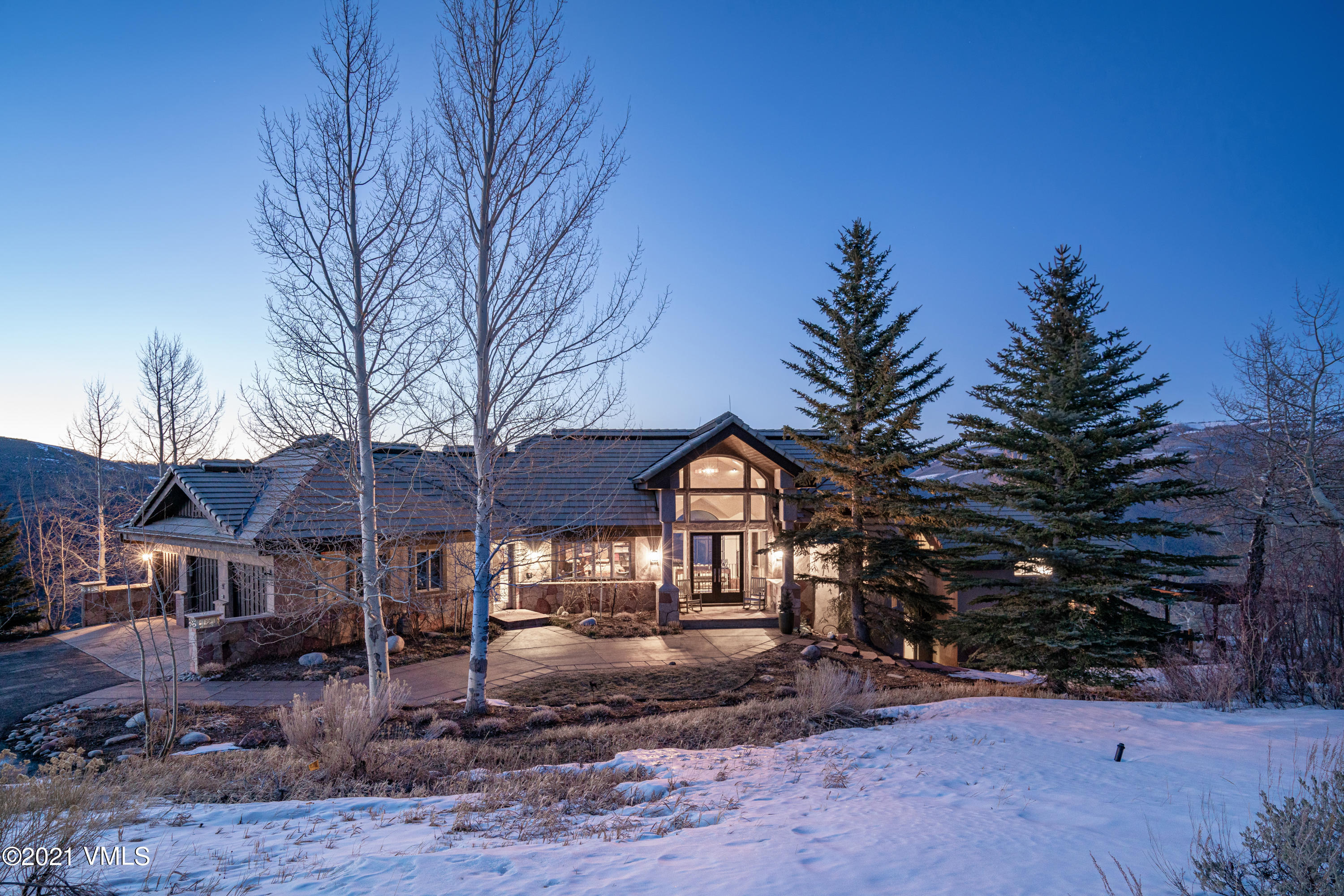 240 Casteel Ridge Edwards, CO 81632 - Photo 61 of 83 a front view of a house with a yard