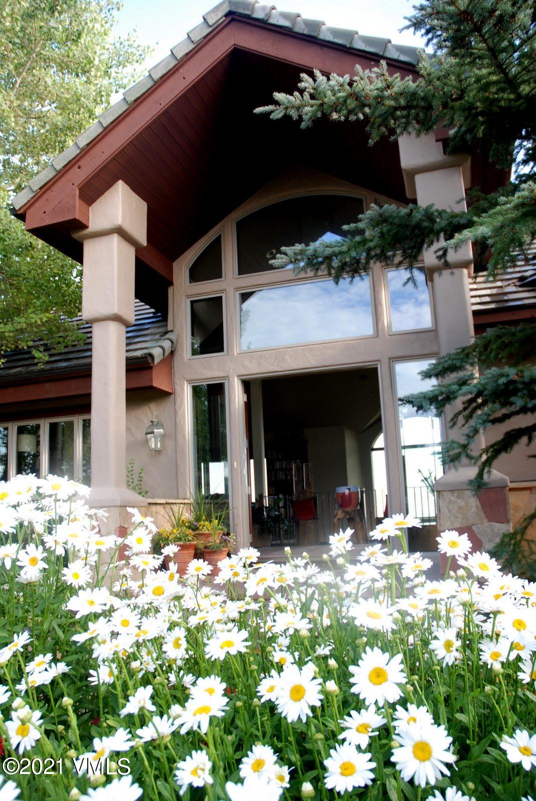 240 Casteel Ridge Edwards, CO 81632 - Photo 77 of 83 a view of a house with a yard