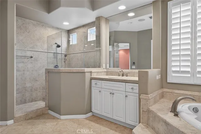 a view of a room with window wooden floor and chandelier