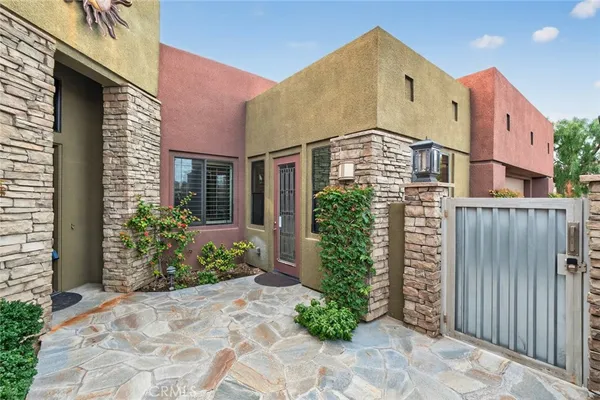 a view of a pathway with a house
