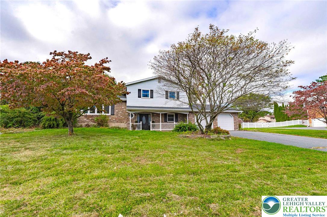 a house view with a garden space