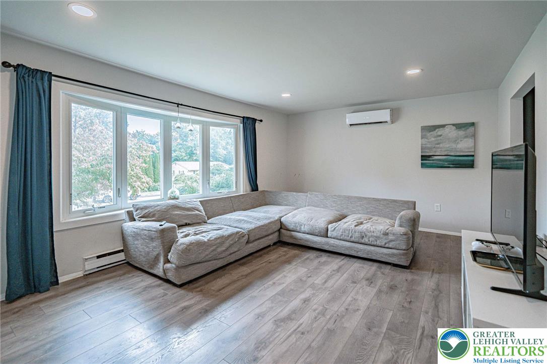 7523 Franks Drive Bath, PA 18014 - Photo 13 of 40 a living room with furniture and a large window