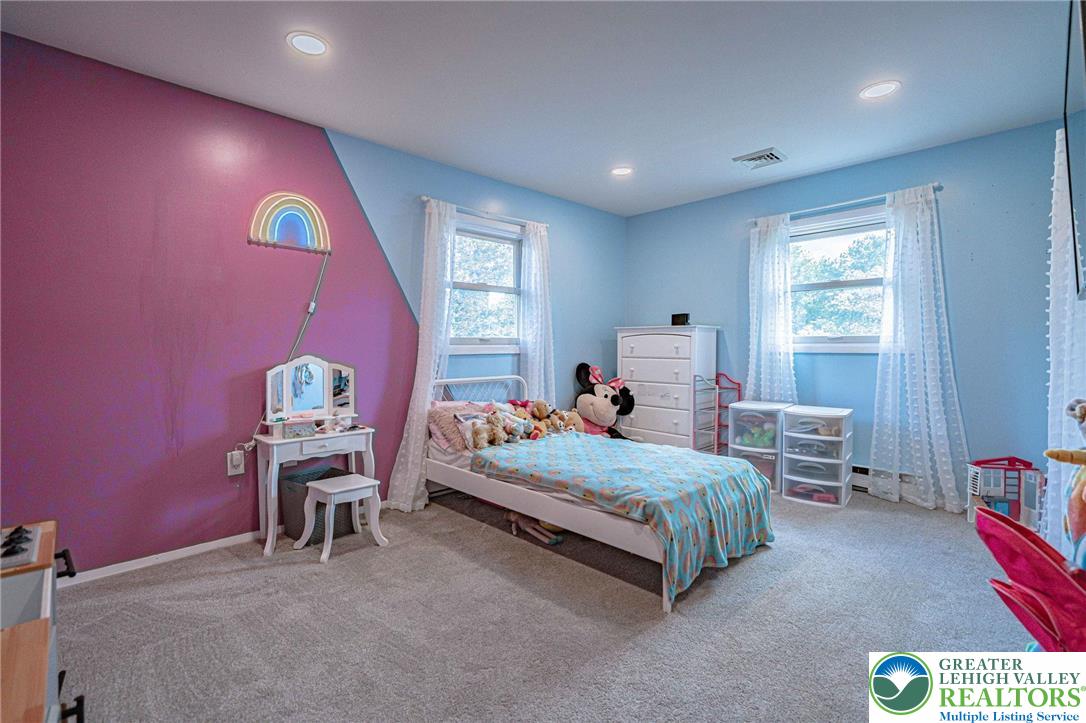 7523 Franks Drive Bath, PA 18014 - Photo 25 of 40 a bedroom with a bed and a desk