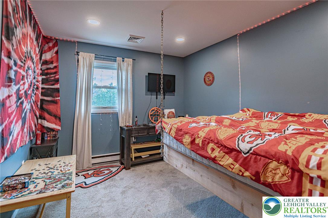 7523 Franks Drive Bath, PA 18014 - Photo 26 of 40 a bedroom with a bed and a window