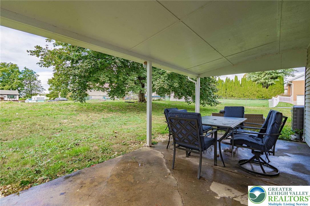 7523 Franks Drive Bath, PA 18014 - Photo 32 of 40 a view of a yard with furniture and garden