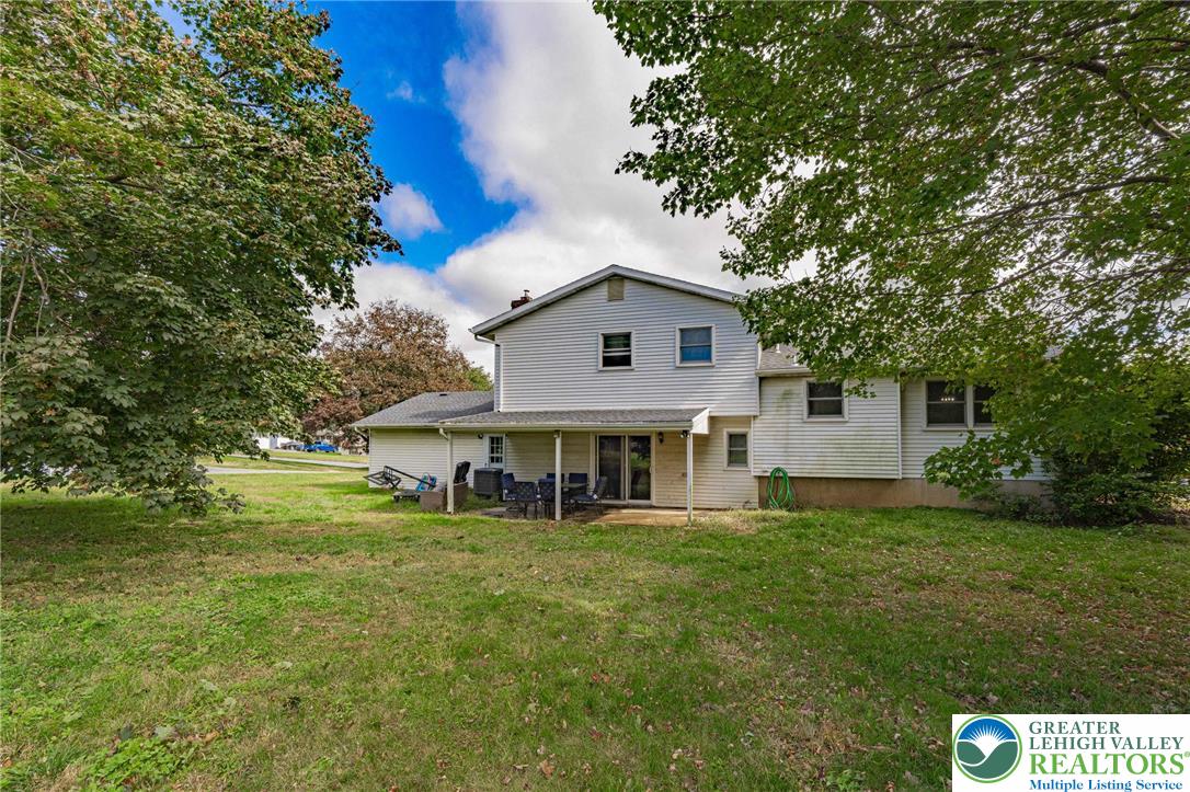 7523 Franks Drive Bath, PA 18014 - Photo 36 of 40 a front view of a house with garden
