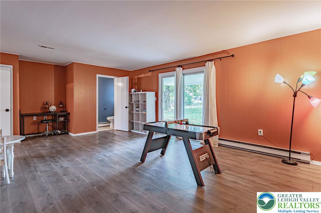 7523 Franks Drive Bath, PA 18014 - Photo 10 of 40 a view of room with furniture and wooden floor