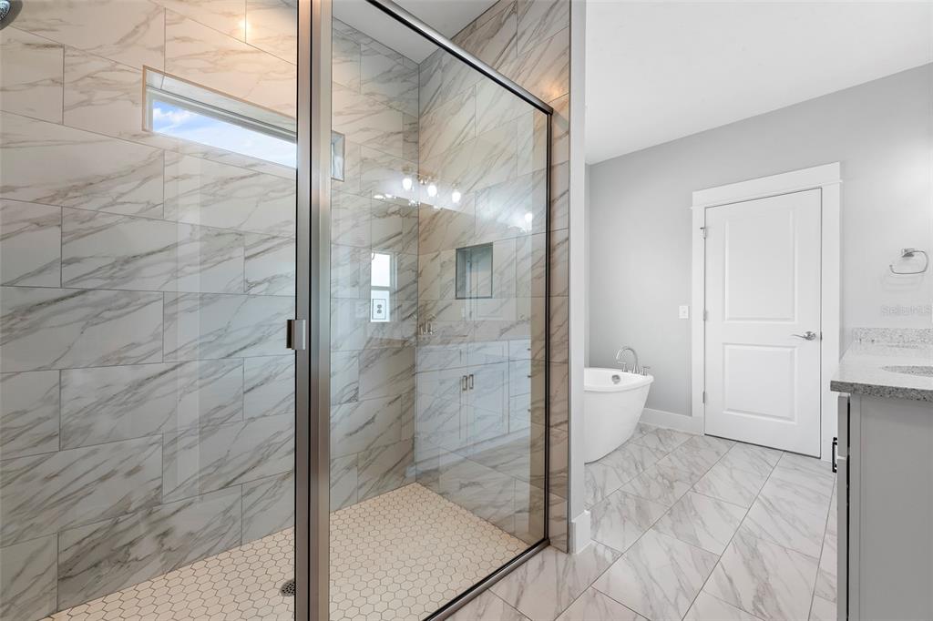 0 Southwest Meadow View Lake City, FL 32024 - Photo 13 of 31 a bathroom with a glass shower door and a toilet
