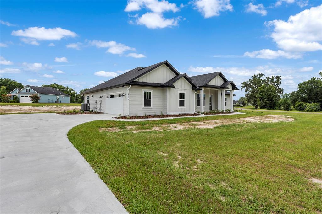 0 Southwest Meadow View Lake City, FL 32024 - Photo 26 of 31 a house with swimming pool in front of it