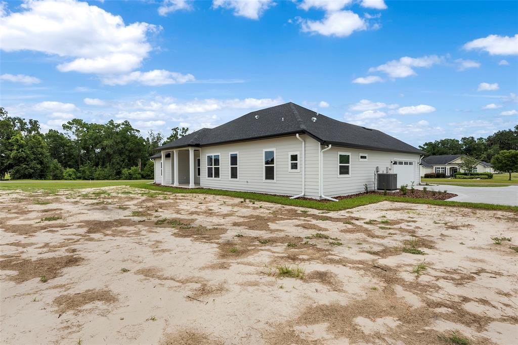 0 Southwest Meadow View Lake City, FL 32024 - Photo 28 of 31 a view of a house with a backyard