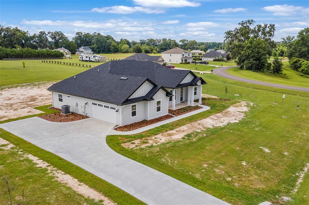 0 Southwest Meadow View Lake City, FL 32024 - Photo 30 of 31 an aerial view of residential houses with outdoor space and swimming pool