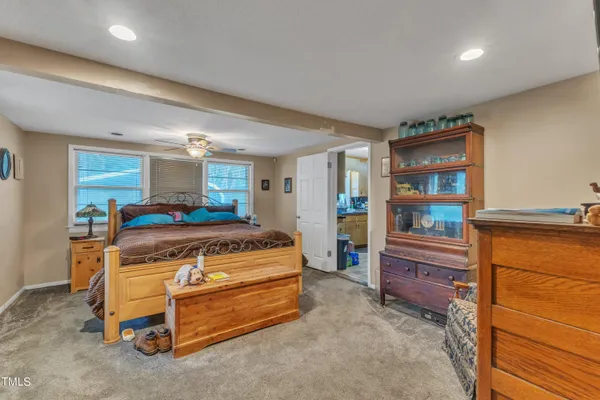 a bedroom with a bed and a cabinets