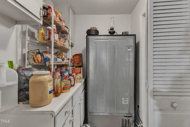 a view of storage and utility room