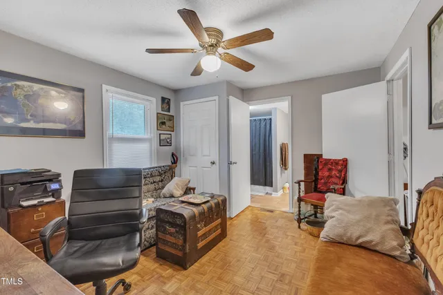 a bathroom with a toilet sink and tub